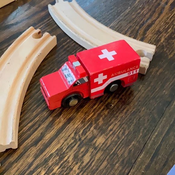 Wooden train tracks at was car wash, and ambulance - Picture 2 of 7